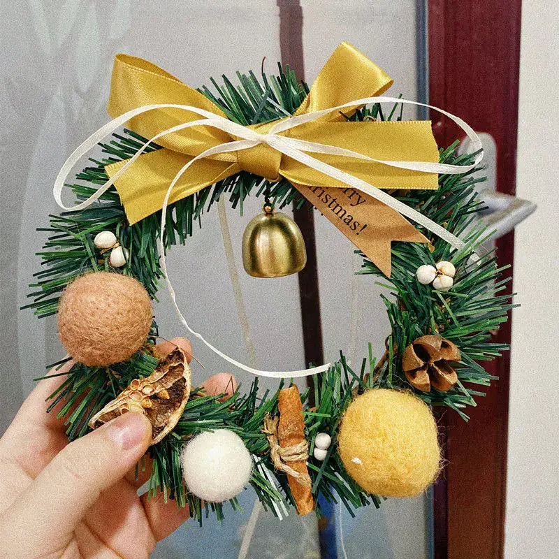 Christmas Gift Decorative Wreath for Home Decor with gold bow and colorful decorations.